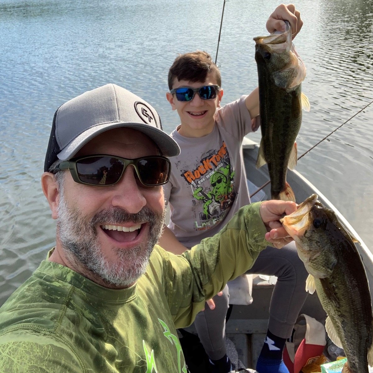 Fishing Guide Photo Contest winners with a largemouth bass double