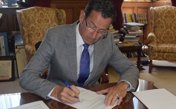 Governor Malloy signing Executive Order 60