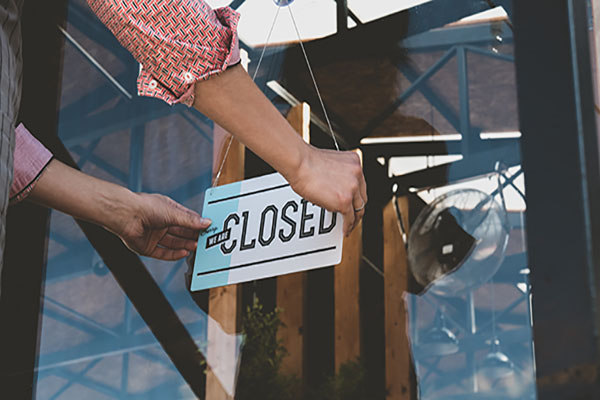 closed sign on the entrance door