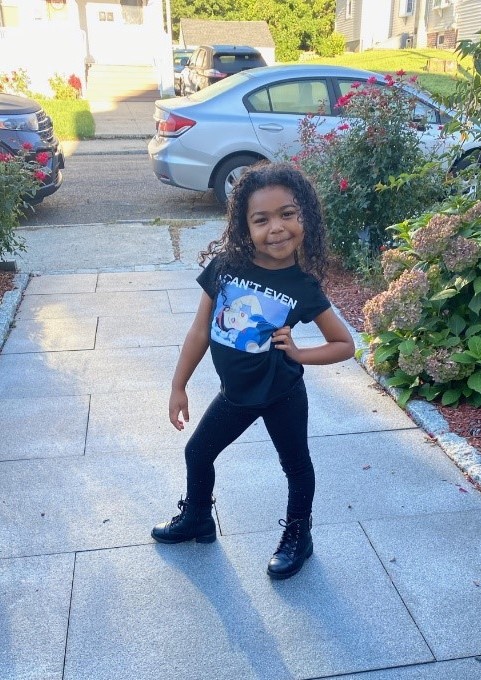 Rodney's daughter with her hand on her hip