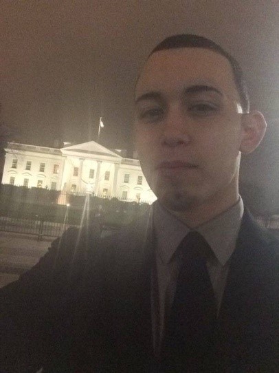 A selfie of Vince in front of the White House at night